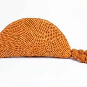 Hand-crocheted raffia clutch with knotted handle