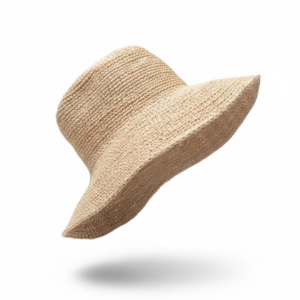 Handmade natural raffia crochet bucket hat with woven texture and wide brim