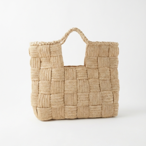 Handmade natural raffia crochet tote bag with square woven pattern and braided handle